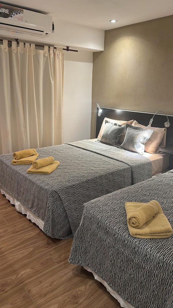 Habitación triple, con cama matrimonial y cama individual